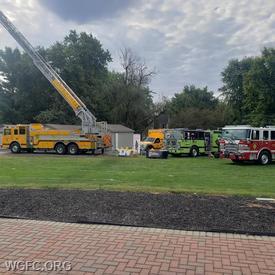Ladder 22, Ambulance 22-4, Engine 23-2, and Engine 21-1 on display at the Annual Sunny Day Camp in Penn Township Park. 